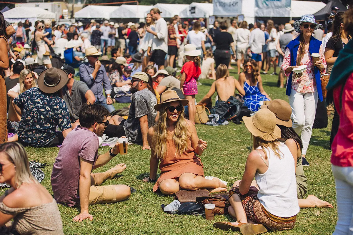 Vibrant food stalls and happy visitors at the Bangalow Food Festival in Byron Bay hinterland