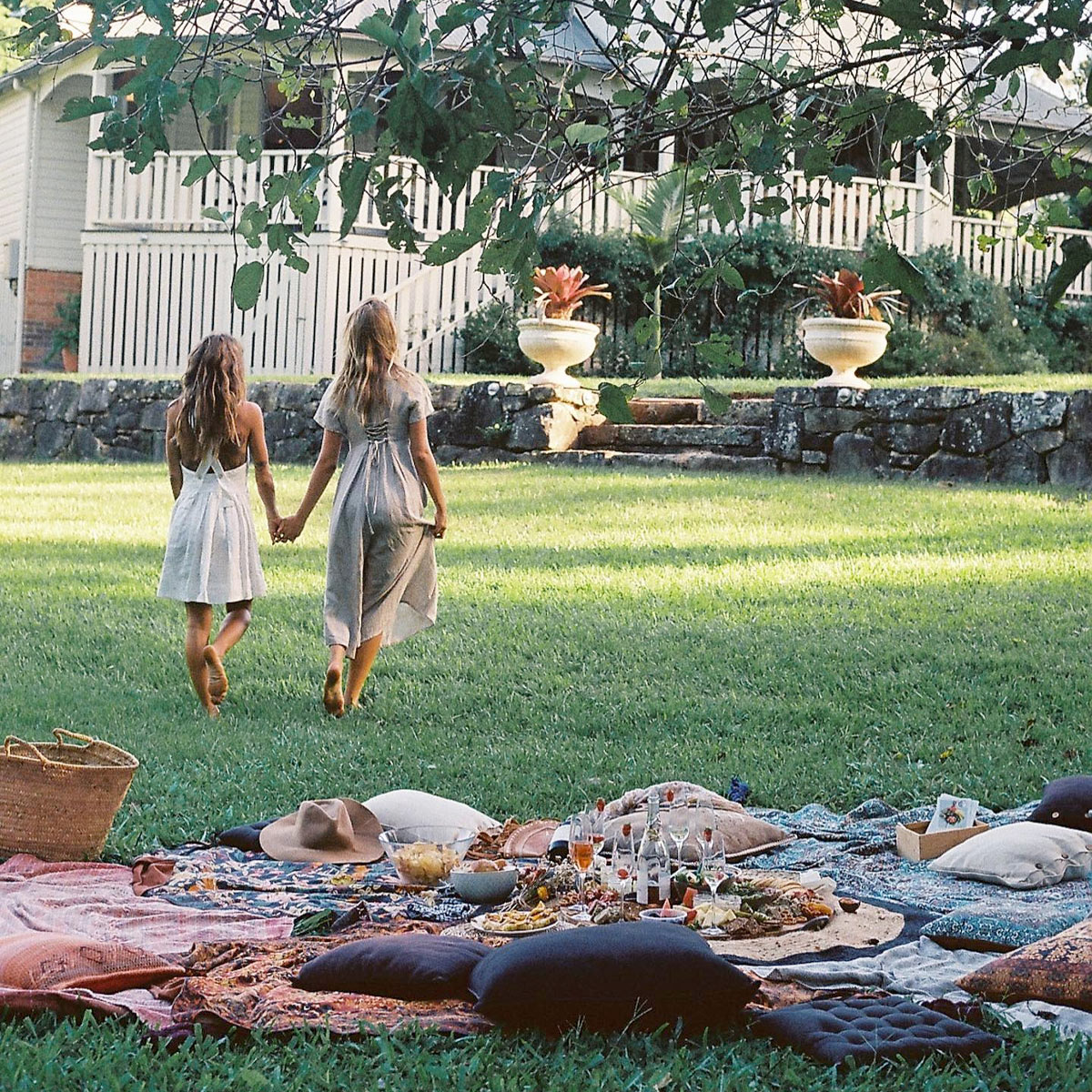 Elegant picnic-style dining setup in the gardens of Bangalow Guesthouse