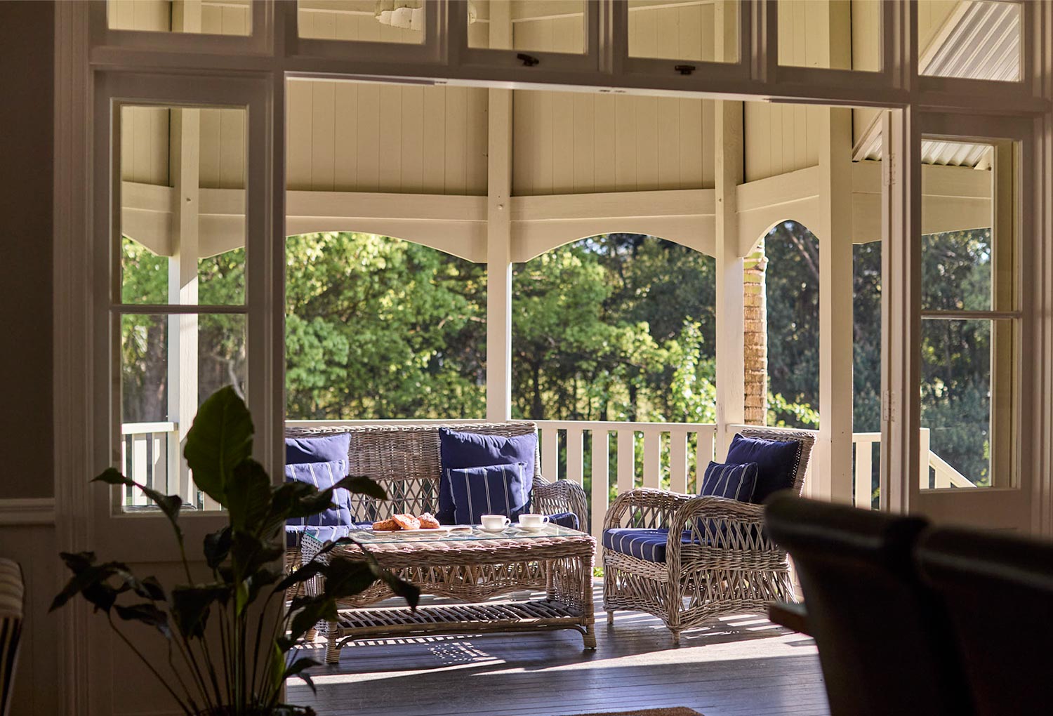 Veranda sitting area at Bangalow Guesthouse — heritage accommodation Byron Bay hinterland