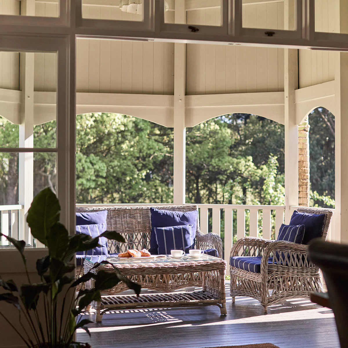 Bangalow Guesthouse Wrap-Around Veranda — Relax in Heritage Style Wrap-around veranda at Bangalow Guesthouse with heritage architecture and garden views in the Byron Bay hinterland