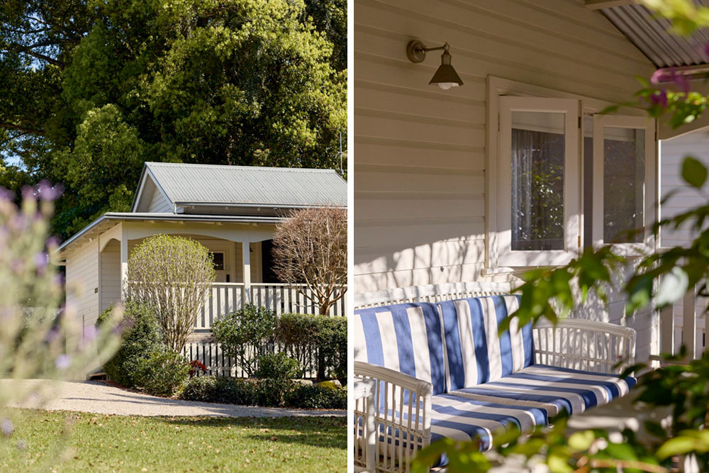 Exterior of Dr Lentaigne’s Cottage at Bangalow Guesthouse with private balcony and comfy outdoor seating surrounded by gardens