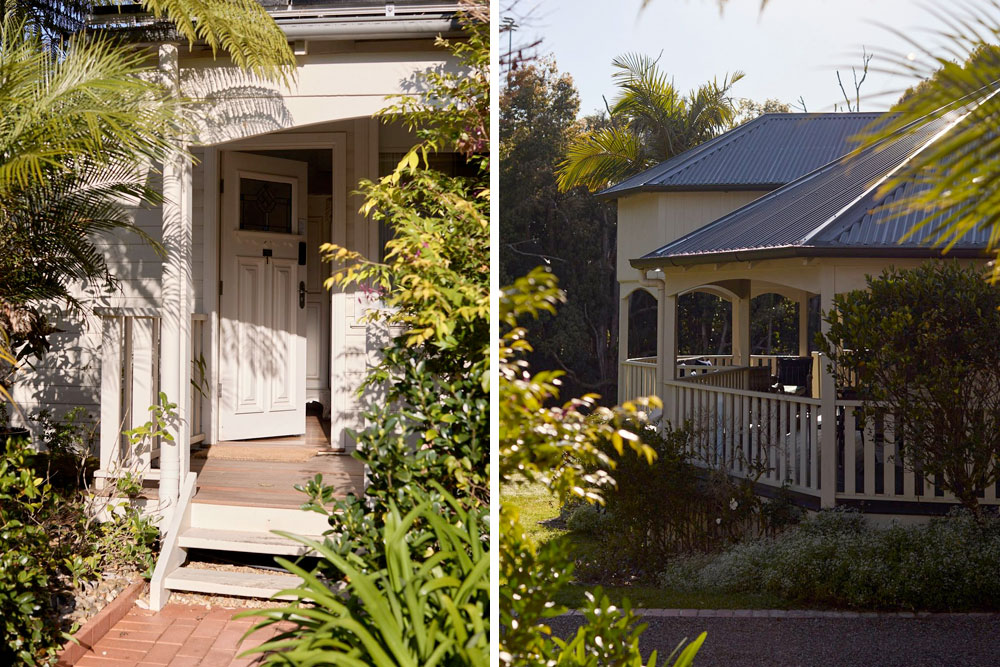 View of Dr Lentaigne’s Cottage front door and Bangalow Guesthouse beyond, surrounded by lush heritage gardens