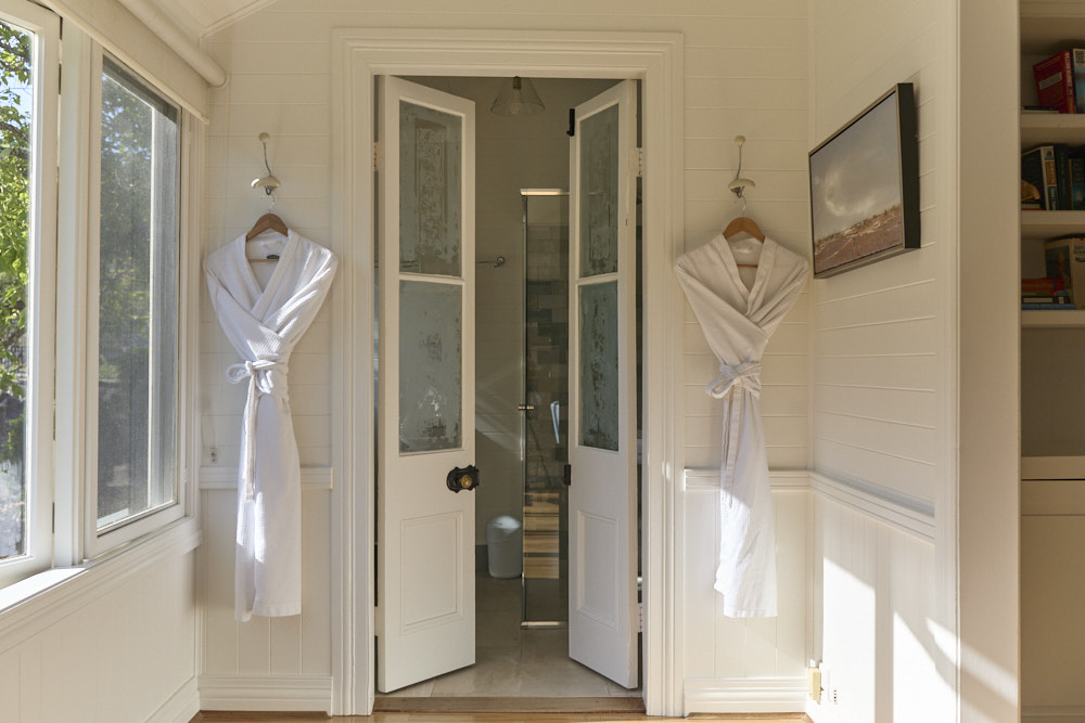 Complimentary organic cotton robes in the Dr Bracken Suite at The Bangalow Guesthouse