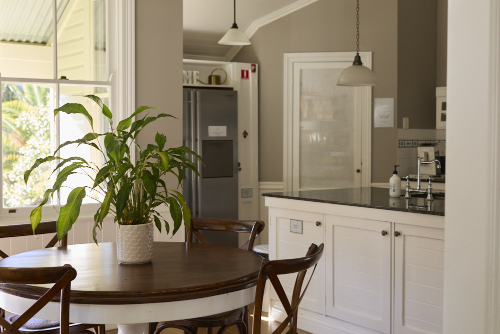 Breakfast table at The Bangalow Guesthouse with heritage charm and garden views
