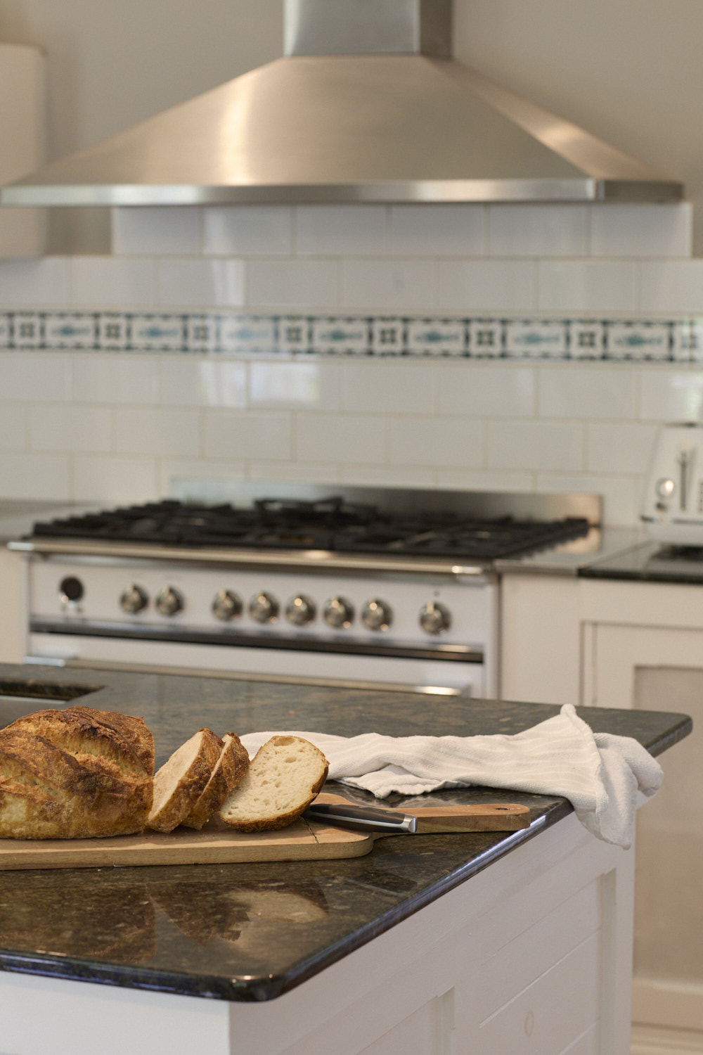 Bright country-style kitchen at The Bangalow Guesthouse with farmhouse details and heritage charm