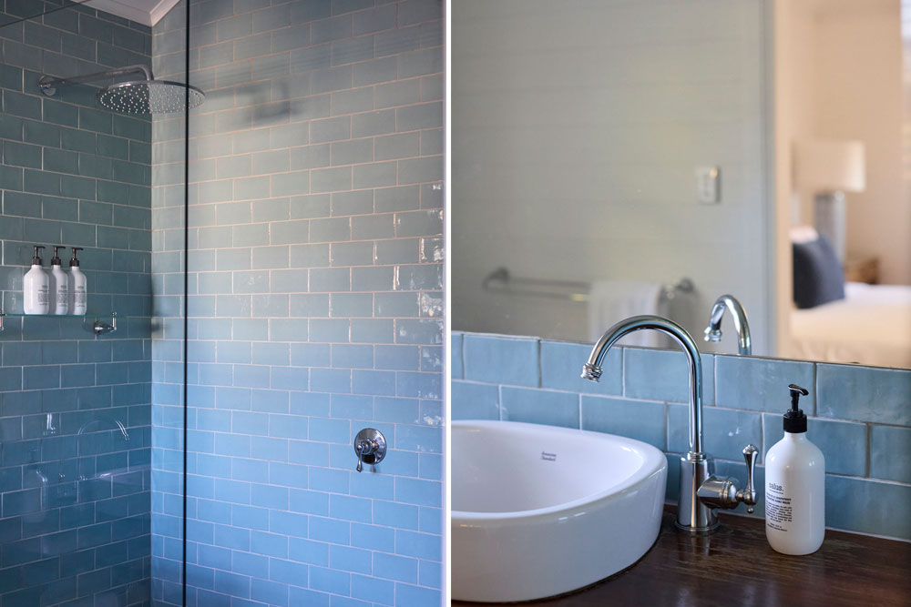 Miller Apartment ensuite with vintage-inspired blue tiled shower at Bangalow Guesthouse near Byron Bay